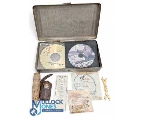 Salmon fly scale with brass stud measuring hooks up to 9/0, a glass fly dresser's bottle in leather pouch, 2x CDs, Hardy 1899