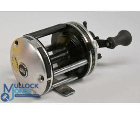 Abu Ambassadeur 6500C multiplier, large twin handles, rim slide on/off check, good free spool, light use, runs well