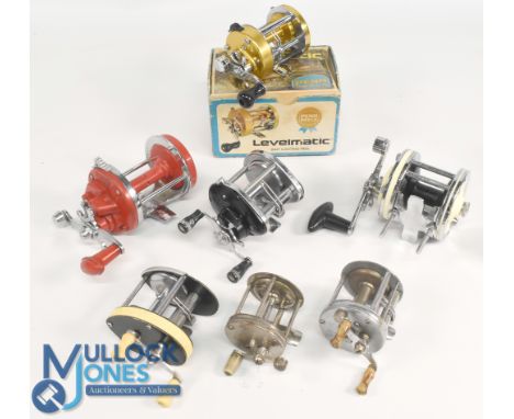 A collection of multiplier reels, all complete, some may need attention, as follows: Penn 930 Levelmatic with correct box and