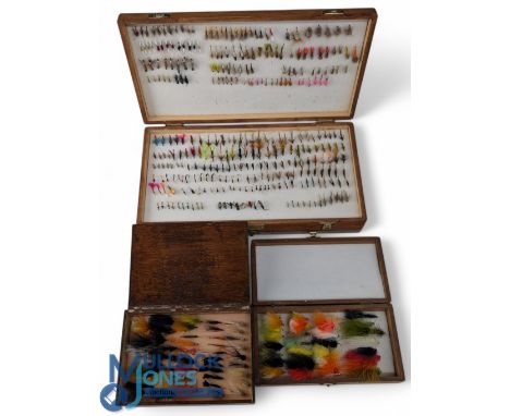 Large triple layer polished wood reservoir 9" x 8", containing varied selection of trout, sea trout, salmon flies and lures, 