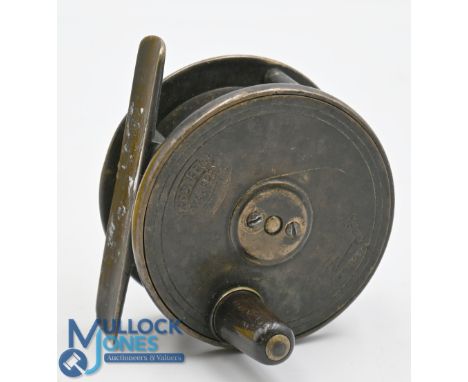 Scarce Hardy Bros Birmingham 2 ¼" brass fly reel with rod in hand and oval trademarks to winding plate, rolling pillared cons