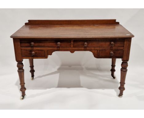 Victorian mahogany desk&nbsp;with an arrangement of four drawers, with turned wooden handles, raised on turned tapering suppo