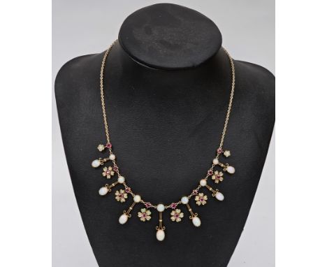 Victorian 18ct gold ruby and opal fringe necklace, having seven double opal drops alternating with six opal and ruby flowerhe