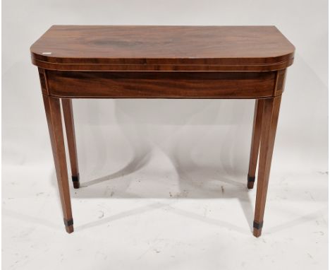 19th century mahogany card table&nbsp;with boxwood and ebony string inlay, the rectangular foldover top with rounded corners,