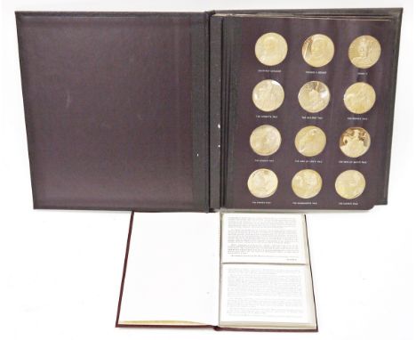 Set of 36 bronze medallions by John Pinches, 'Chaucer and the Canterbury Tales', first edition proof set, in album with a fur