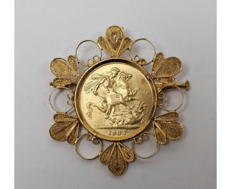18ct gold mounted&nbsp;Victorian 1887 sovereign within stylised leaf and circle surround gross weight 15g approx