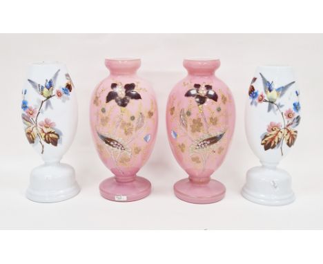 Pair of late 19th century Bristol pink and white cased glass vases of baluster form with enamelled with floral decoration, 31