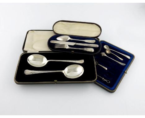 A mixed lot of cased silver flatware, various dates and makers, comprising: a pair of serving spoons, with stud borders, Shef