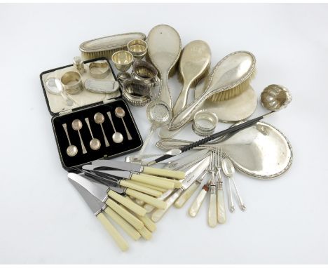 λ A mixed lot, comprising silver items: a George III snuff box, Birmingham 1808, fluted oval form, flush-hinged cover, plus a