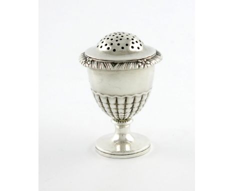 A George III silver caster, maker's mark worn, possibly by Paul Storr, London 1812, vase form, rocaille decoration, gadroon b