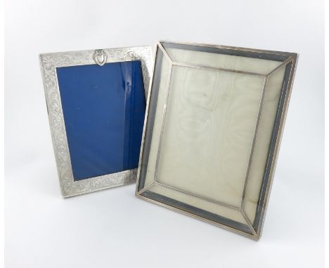 A silver photograph frame, by Asprey and Co, London 1915, rectangular form, with a silver mount, leather easel back, height 2