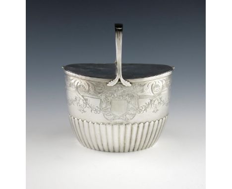 A George III silver double tea caddy, by John Schofield London 1797, oval form, part-fluted decoration, fluted handle, with t