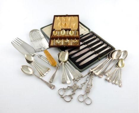 λ A mixed lot of silver flatware, various dates and makers, comprising: a George III fish slice, by John Emes, London 1800, a