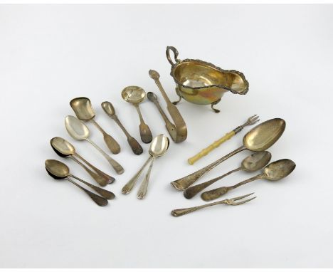 λ A mixed lot of silver items, comprising: a sauce boat, by Martin Hall & Co Ltd, Sheffield 1912, with foliate scroll border,