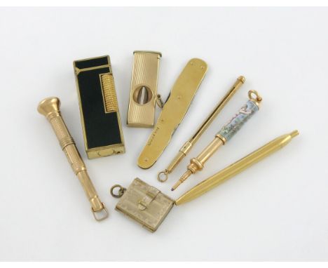 A mixed lot of gold and gilt items, comprising gold items: a folding knife and striker, by Mappin & Webb, Sheffield 1905, ste