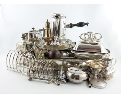 λ A mixed lot of electroplated items, comprising: a French chocolate pot, two circular salvers, a waiter, two toast racks, a 