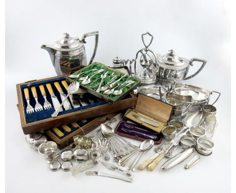 λ A mixed lot, comprising silver items: a Tiffany sugar sifting spoon, two tablespoons, a page marker, a caddy spoon, a cased