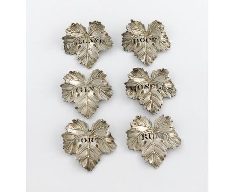 A set of six Victorian electroplated wine labels, unmarked, vine leaf form, pierced 'GIN', 'HOCK', 'HOLLANDS', 'MOSELLE', 'RU