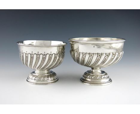 An Edwardian silver rose bowl, by W. Haseler, Birmingham 1909, circular form, part-fluted decoration, on a circular form, plu