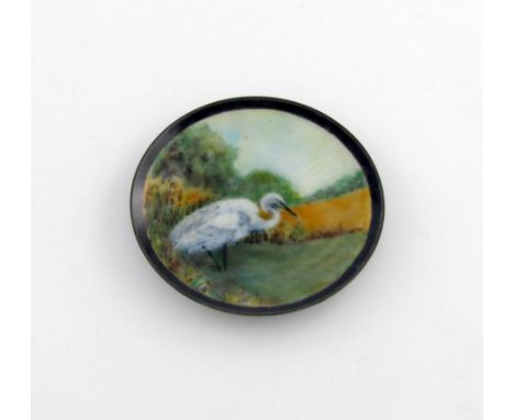 A Norwegian silver and enamel dish, by David Anderson, circa 1920, circular form, enamelled with an egret in a landscape sett