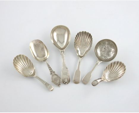 A collection of six antique silver caddy spoons, comprising: a George III Fiddle, Thread and Shell spoon, by Eley, Fearn and 