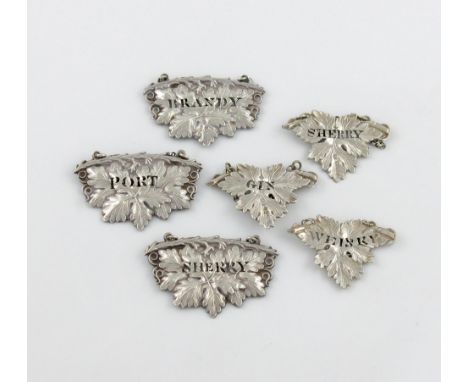 A small collection of six silver vine leaf wine labels, comprising: two by George Unite, Birmingham 1868 and 1890, pierced 'G