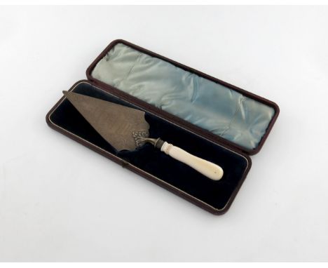 λ A Victorian presentation silver trowel, by H. Atkin, Sheffield 1884, the triangular blade with an inscription relating to '