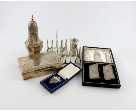 A mixed lot of silver items, various makers and dates, comprising: an octagonal baluster sugar caster, by Henry Matthews, Bir