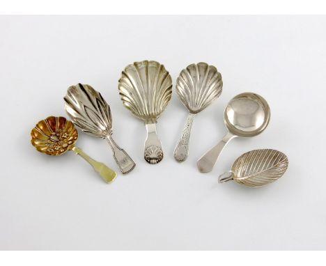 A collection of six antique silver caddy spoons, comprising: one of leaf form, Birmingham 1798, one by Josiah Snatt, London 1