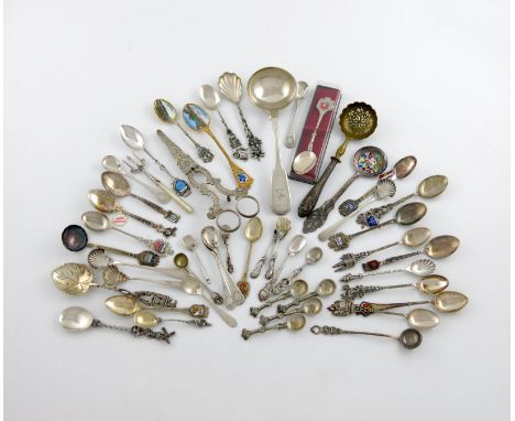 A mixed lot of English and Foreign silver and metalware flatware, comprising: a William IV sauce ladle, London 1832, a pair o