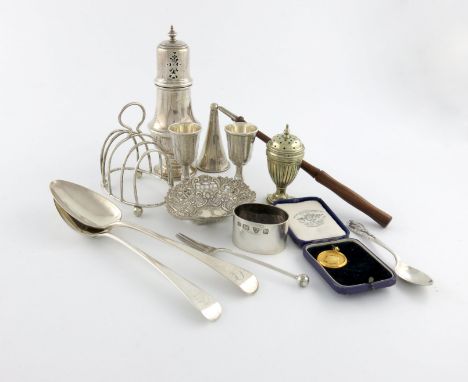 A mixed lot of silver items, various dates and makers, comprising: a sugar caster, Birmingham 1940, two tablespoons, a pair o