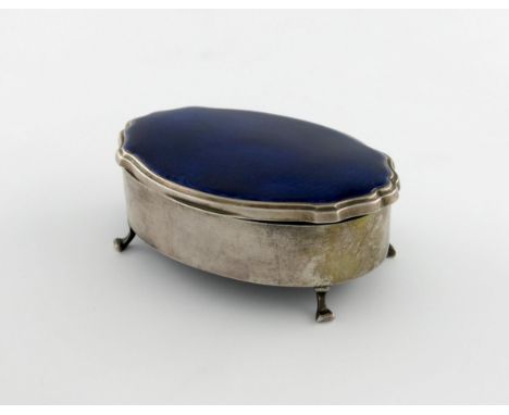 A silver and enamel trinket box, by Mappin and Webb, London 1935, shaped oval form, the hinged cover with purple enamel decor