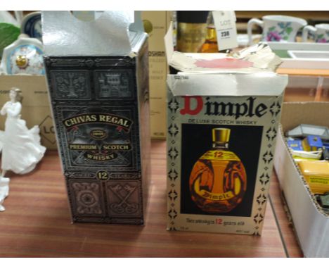 A bottle of Chivas Regal Scotch Whisky; and a box of Dimple Deluxe Scotch Whisky.