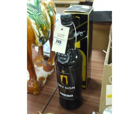 A bottle of Sandeman Dry Don Medium Sherry; and a bottle of John Harvey Light Smooth Sherry.