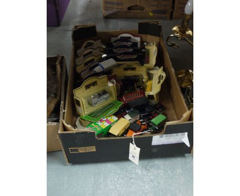 A box of die-cast and other model vehicles.