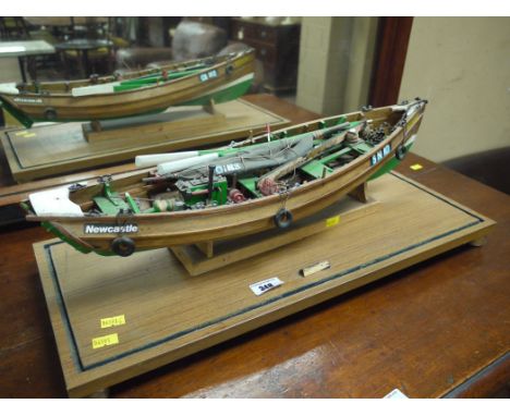 A planked model of a North East Coast fishing coble 'Natalie'.