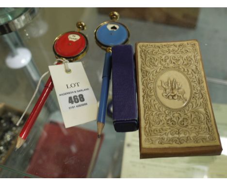 A set of Chad Valley poker dice in original case; bridge cards score notepad; and a pair of bridge players card markers incor