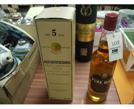 A bottle of Pure Malt Scotch Whisky; and bottle of 5 year old Auchentoshan Triple Distilled Single Lowland Malt Scotch Whisky