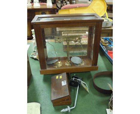 A cased balance scale; and a mahogany case containing weights; together with a fly-tying jig.