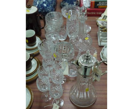 A quantity of cut glass, including: wine glasses; bowls; decanter; and a silver plated mounted claret jug.