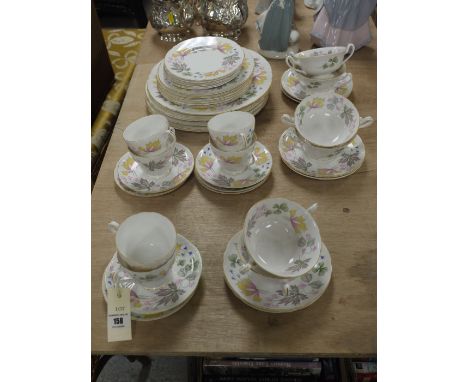 A Shelley floral decorated part dinner and tea service.