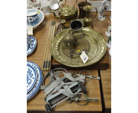 A wooden ruler in box; together with a collection of brass ware, including: postal scales; etc.