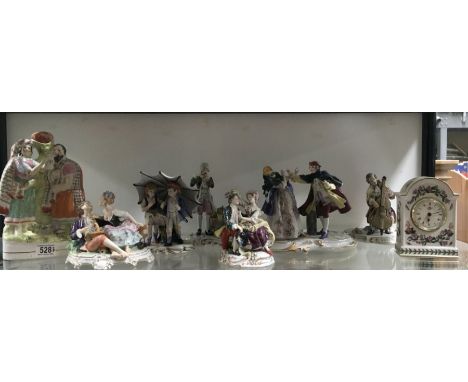 A large collection of Continental porcelain figure groups including Capodimonte and Dresden style, together with a Staffordsh