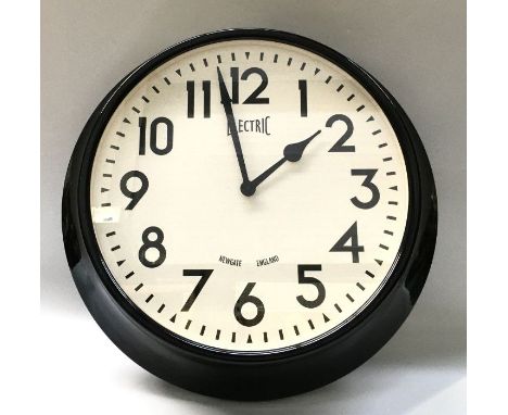A Newgate battery wall clock, 44cm dial diameter