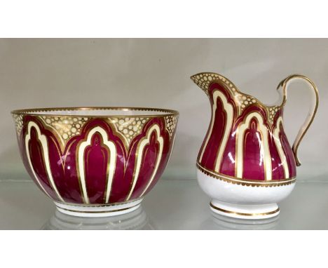 A Victorian Staffordshire porcelain jug and slop bowl, circa 1840, possibly Spode, maroon and gilt arcaded design (2)