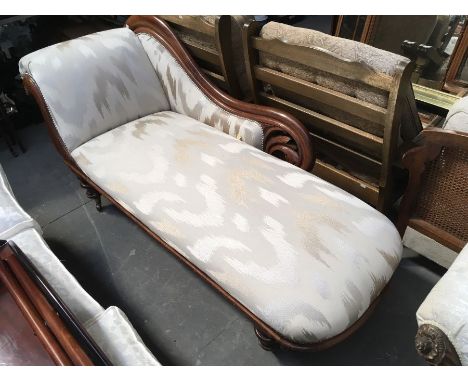 A Victorian mahogany framed chaise, on ring turned supports, 187cm long x 84cm 