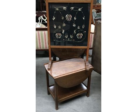 An early 20th century oak drop-flap two tier occasional table, together with a oak framed  fire screen, glazed panel enclosin