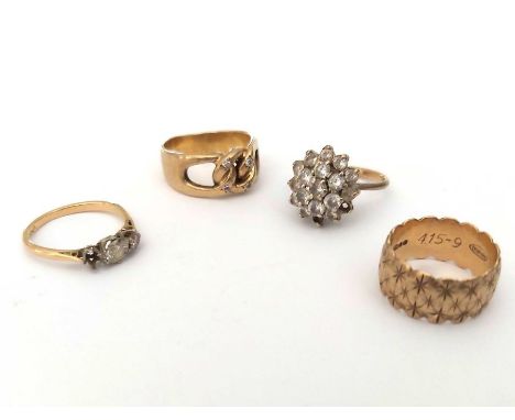 Four gold rings, including a 9ct gold diamond cluster ring (two diamonds missing), a three-stone diamond ring (one diamond mi