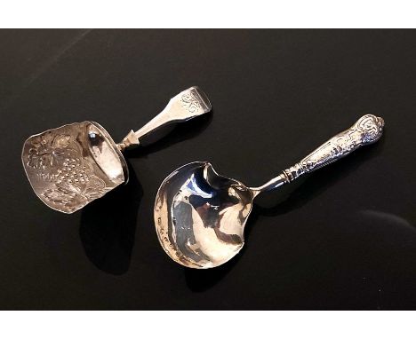 Two Georgian silver tea caddy spoons, one by William Lea &amp; Co, Birmingham 1814, bowl embossed with grapes and engraved ha