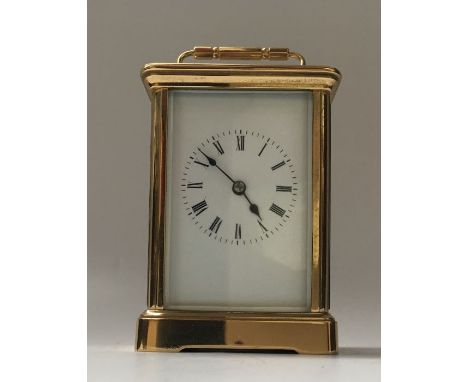 A late 19th century French gilt brass carriage clock with repeat, 12.5cm high